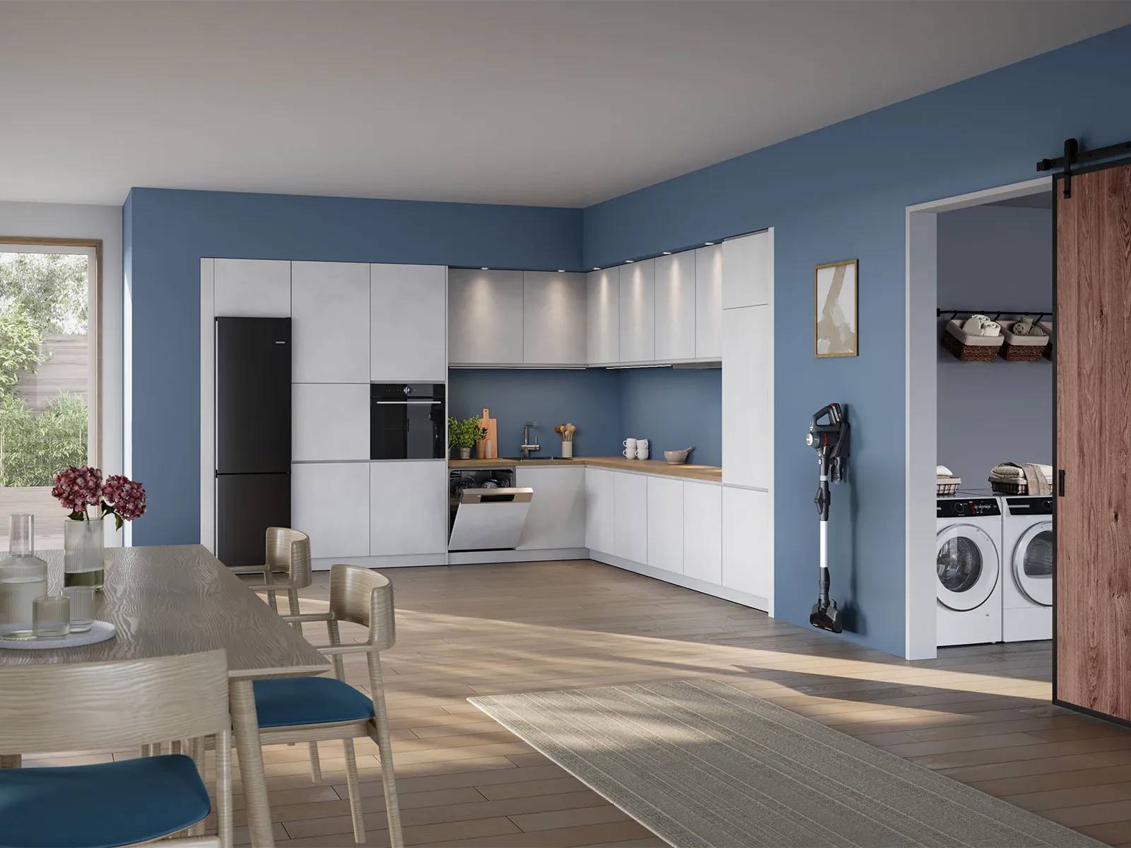 Helle Küche mit Essbereich und Bosch Hausgeräten